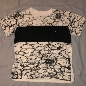 T-shirt with pattern it also says savage on front